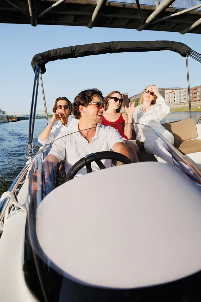 Private self-drive motorboat on the Vistula in Kraków with What a Boat